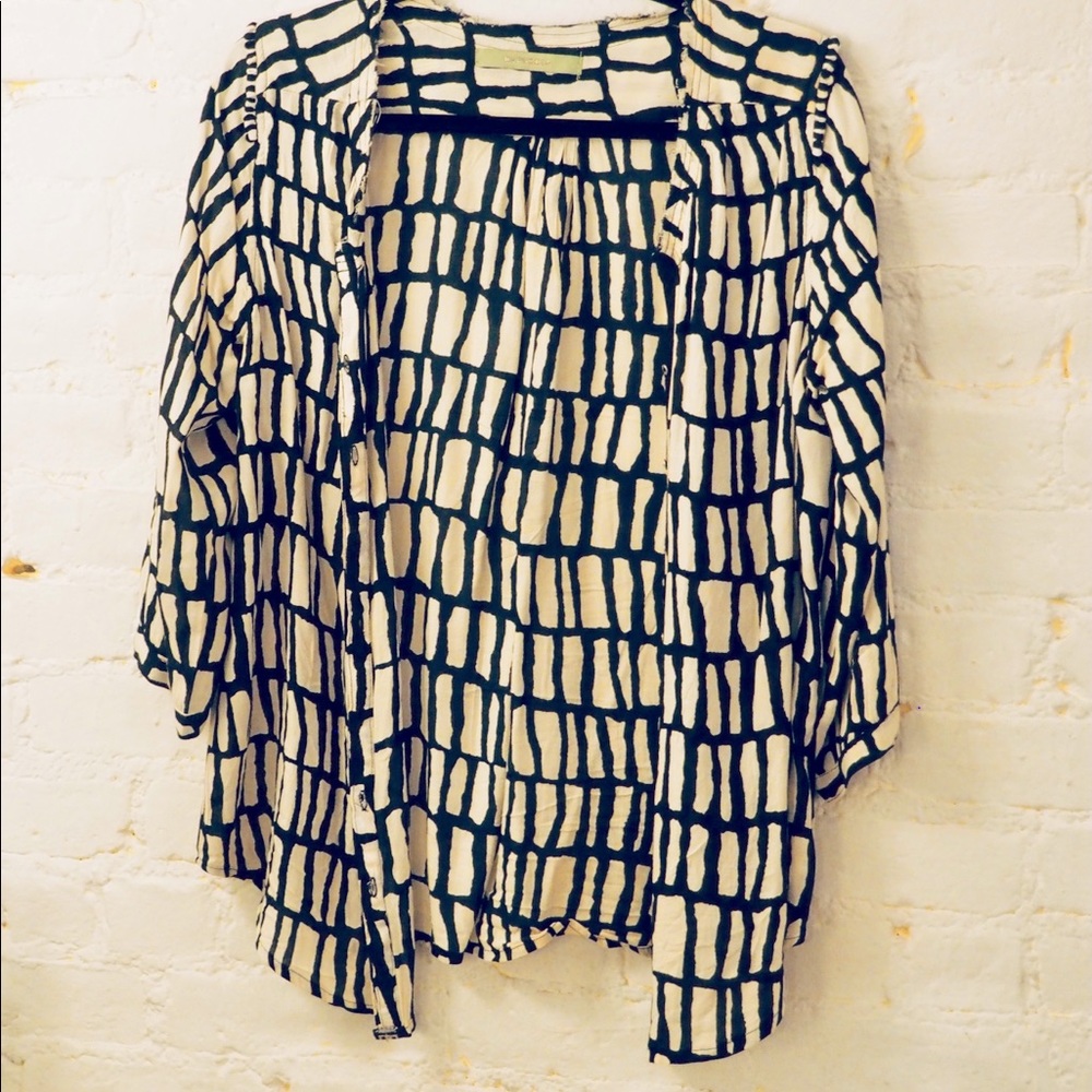 Off white tunic with black print. Made in Argentina.